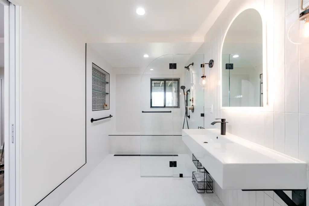 Kitchen and Junior ADU remodel in Hollywood, with natural oak cabinetry and a quartz waterfall island — photo 8 of 20