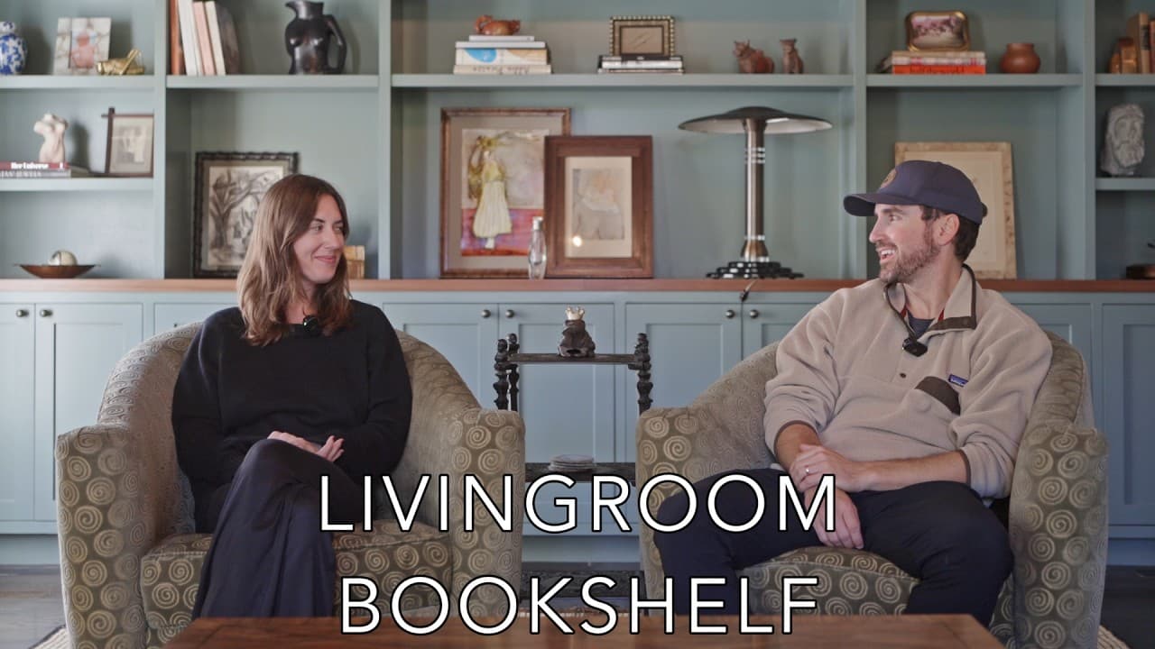 Floor-to-ceiling built-in bookshelf in Hollywood, with open display shelving above closed cabinetry