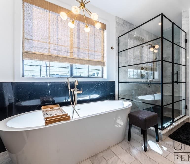 Luxury bathroom remodel with walk-in shower and freestanding tub by UpFront Remodeling