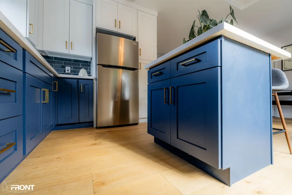 Garage converted into a self-contained ADU in Valley Village, with navy shaker cabinetry and quartz counters — photo 13 of 13