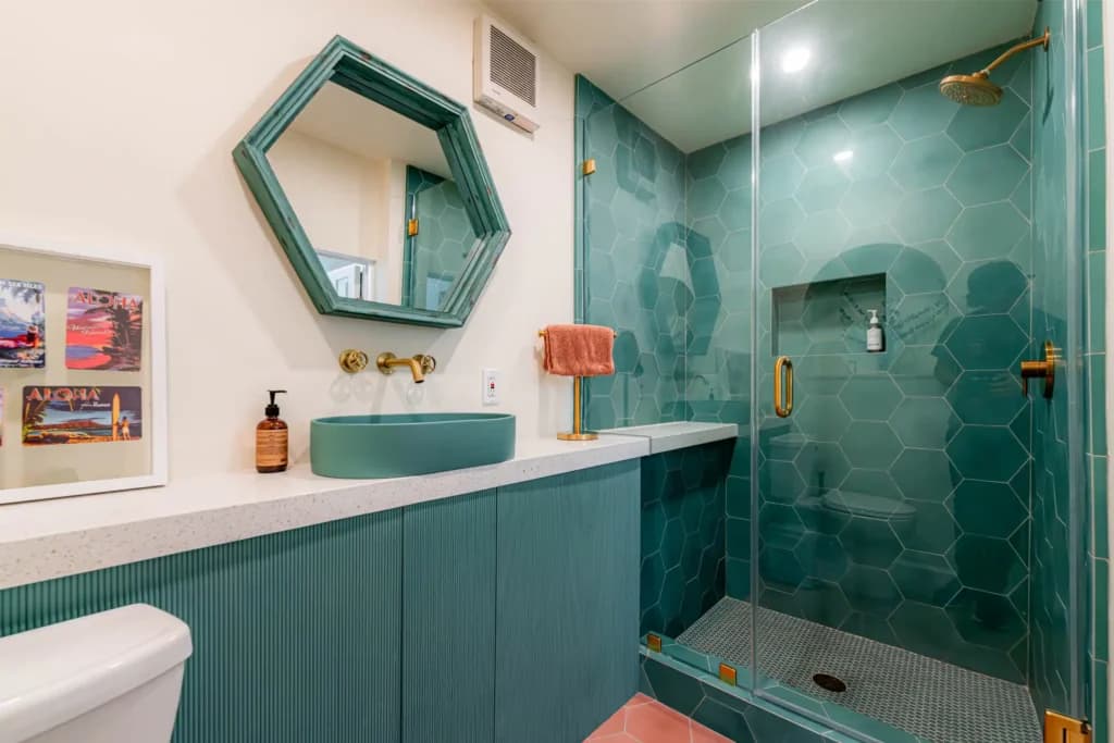 Master and guest bathroom remodel in Los Angeles, with a tiled walk-in shower and dual-sink quartz vanity — photo 12 of 13
