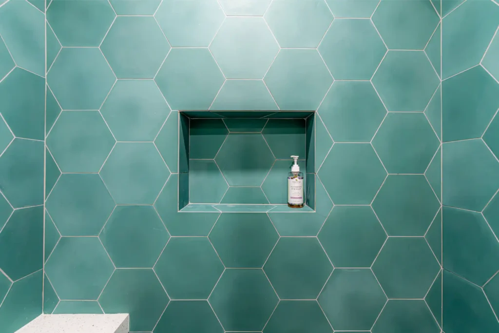 Master and guest bathroom remodel in Los Angeles, with a tiled walk-in shower and dual-sink quartz vanity — photo 11 of 13