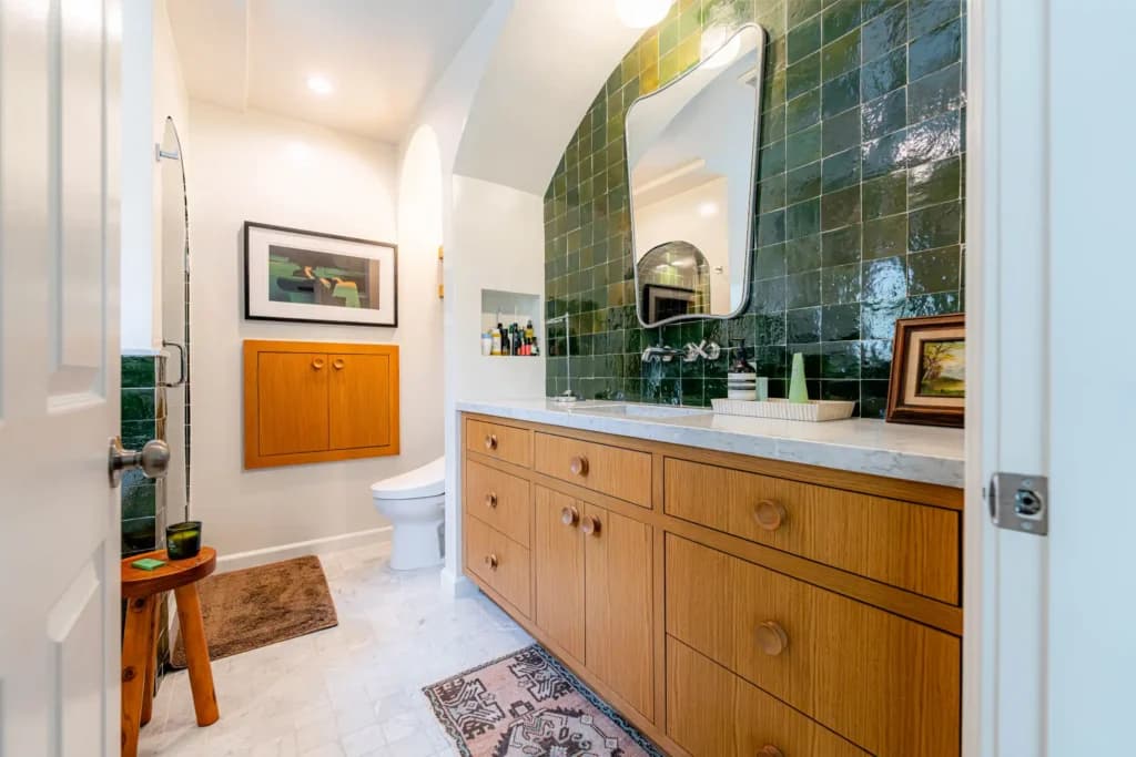 Master and guest bathroom remodel in Los Angeles, with a tiled walk-in shower and dual-sink quartz vanity — photo 8 of 13