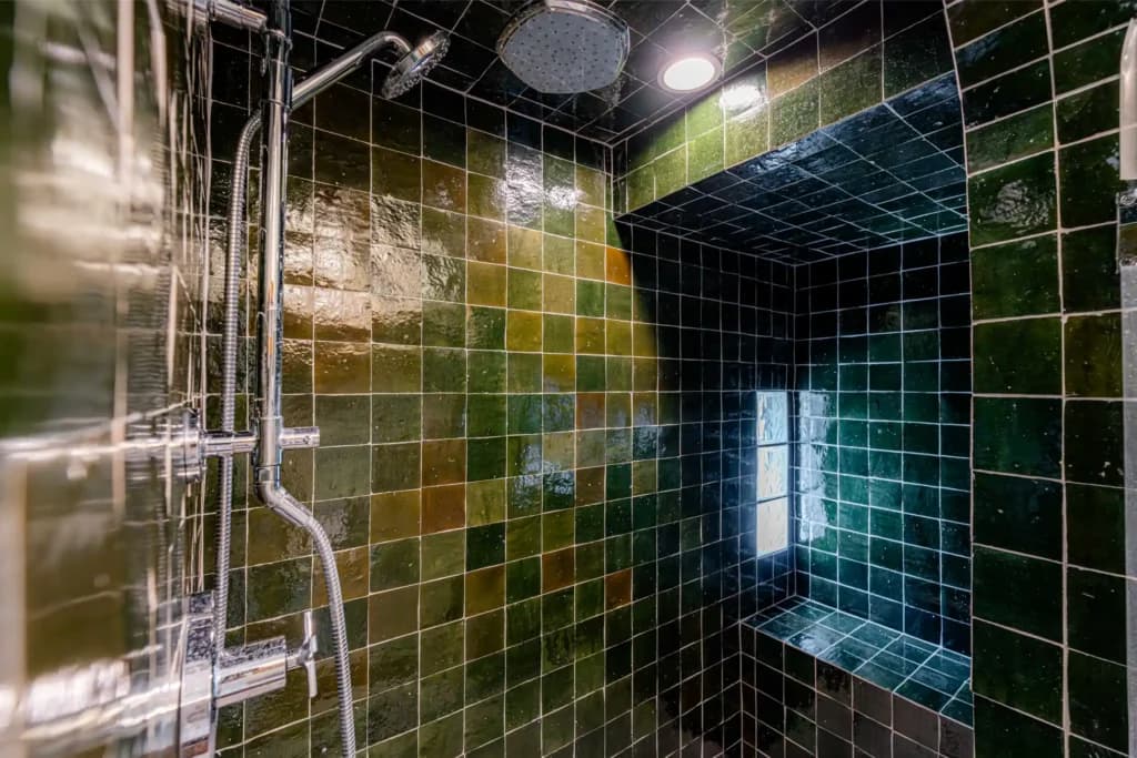 Master and guest bathroom remodel in Los Angeles, with a tiled walk-in shower and dual-sink quartz vanity — photo 6 of 13