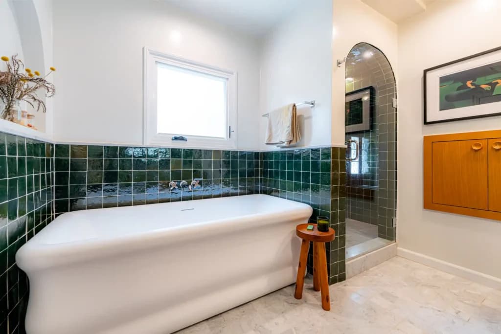 Master and guest bathroom remodel in Los Angeles, with a tiled walk-in shower and dual-sink quartz vanity — photo 5 of 13