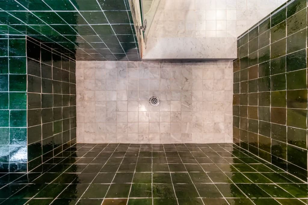 Master and guest bathroom remodel in Los Angeles, with a tiled walk-in shower and dual-sink quartz vanity — photo 3 of 13