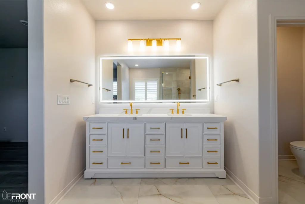 Spa-inspired master bathroom remodel in Simi Valley, with a brushed-gold double vanity and walk-in shower — photo 3 of 9