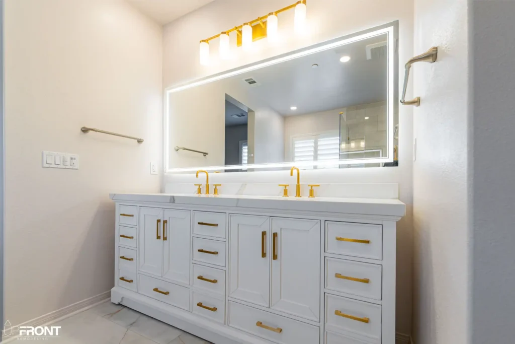 Spa-inspired master bathroom remodel in Simi Valley, with a brushed-gold double vanity and walk-in shower — photo 4 of 9