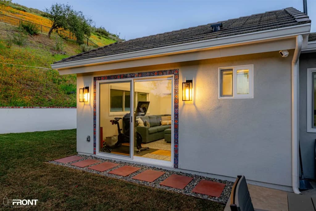 Detached room addition in Westlake Village, finished in smooth stucco with a pitched tile roof — photo 3 of 15
