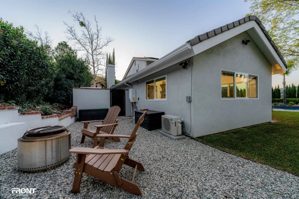 Detached room addition in Westlake Village, finished in smooth stucco with a pitched tile roof — photo 5 of 15
