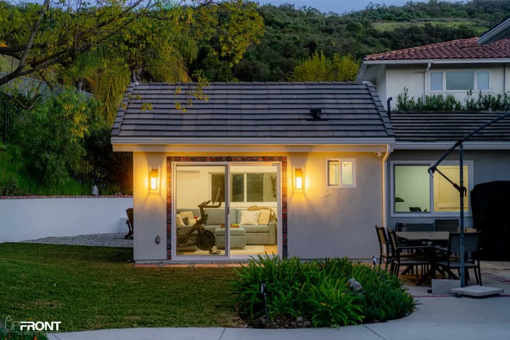 Detached room addition in Westlake Village, finished in smooth stucco with a pitched tile roof — photo 8 of 15